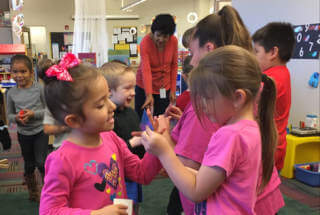 Kids in class learning doing an activity