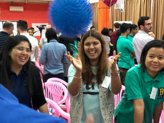 Teachers laughing in a training program